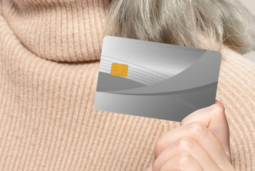 Someone holding a Wells Fargo Active Cash Card.