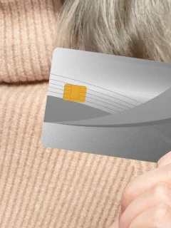 Someone holding a Wells Fargo Active Cash Card.