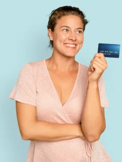 A woman with her Citi Custom Cash Credit Card.
