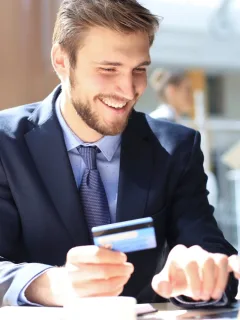 A man using his business credit card.