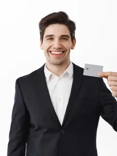 A guy holding his Southwest Rapid Rewards.