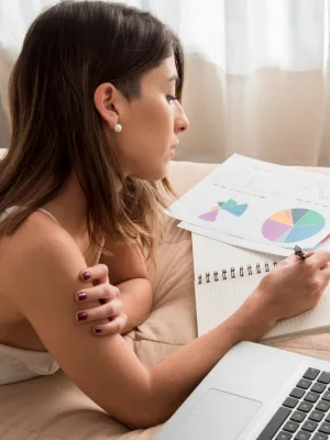 Woman learning What is a FICO Score.