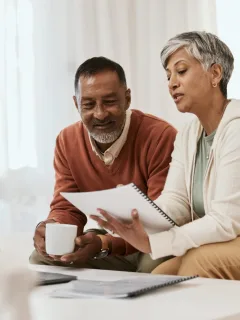 A couple checking the Credit History.