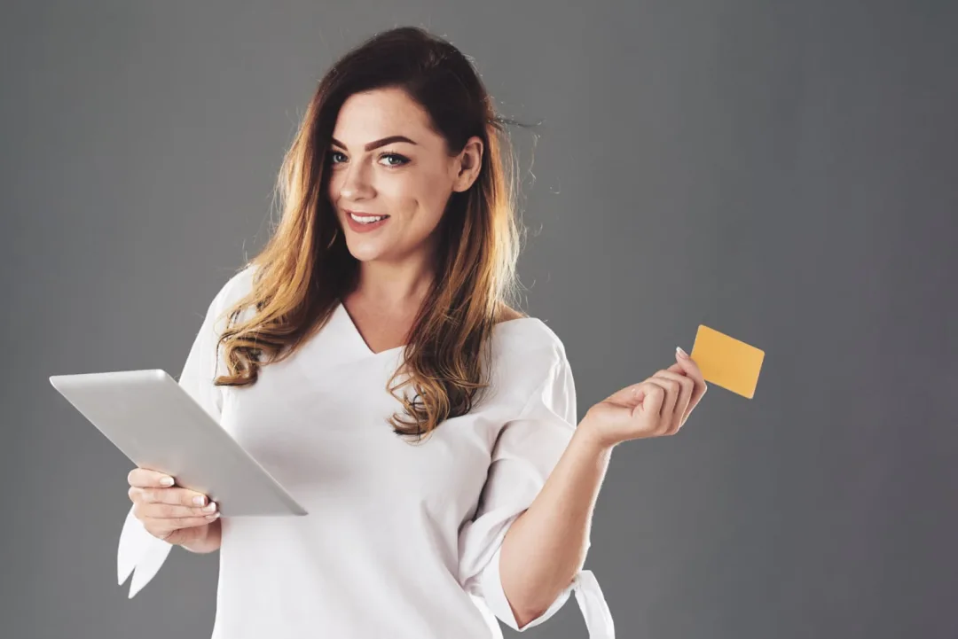 Woman learning about Credit Card Interest rates.