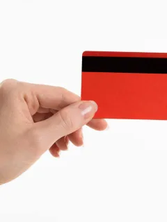 Someone holding the Fit Platinum Mastercard.
