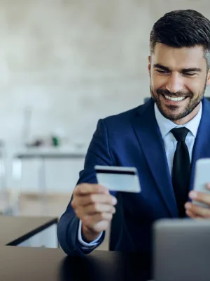 A man learning How to apply for a business credit card.