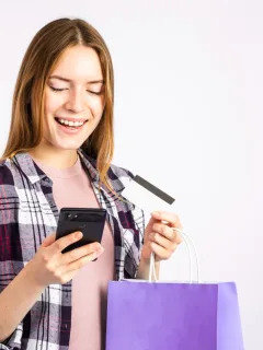 Woman using AliExpress Discount Coupons.
