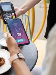A person using Contactless payments.