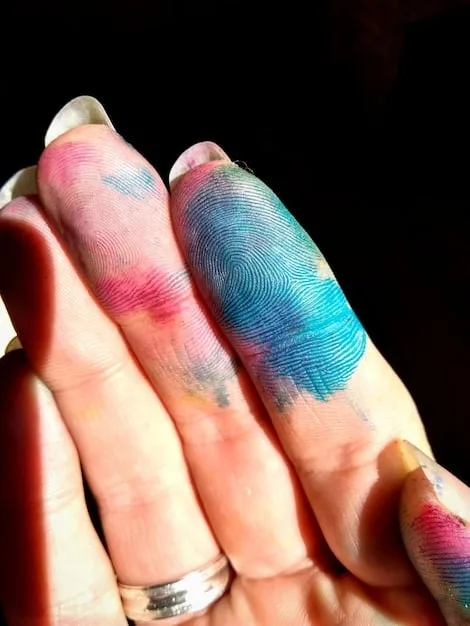 A detailed shot of a hand with freshly painted nails in a vibrant color, with a focus on the smooth, glossy finish and perfectly clean edges, showcasing the successful application.