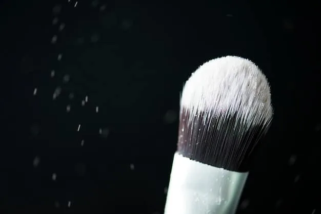 A set of clean, dry makeup brushes neatly arranged in a brush holder, sparkling under bright light, emphasizing hygiene and readiness for use.