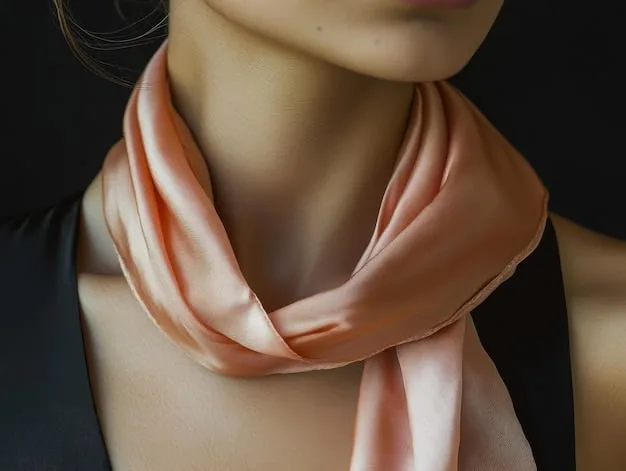 A close-up shot of a silk scarf tied elegantly around a woman's neck, with a subtle pattern and rich colors. Her outfit is simple, allowing the scarf to be the main focus.