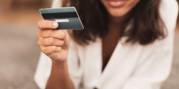 A woman holding her CareCredit