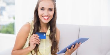 Woman using the U.S. Bank Cash+ Visa Signature.