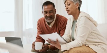 A couple checking the Credit History.