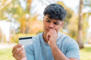 man in doubt about how a joint credit card works