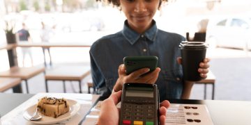 Woman using Virtual Credit Card to make payments.