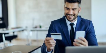 A man learning How to apply for a business credit card.