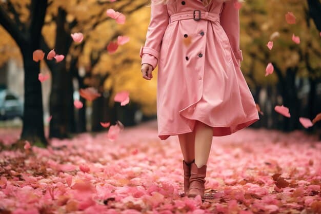 A woman in a soft blush pink ruffled-sleeve blouse tucked into a dark navy A-line skirt, with delicate gold accessories, presenting a sweet and chic aesthetic.