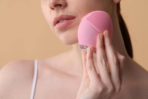 A close-up of a hand holding a makeup sponge applying liquid foundation onto a model's cheek, showing smooth, blended results, emphasizing technique.