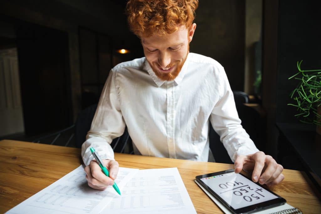 Person reviewing investments through an online financial platform.